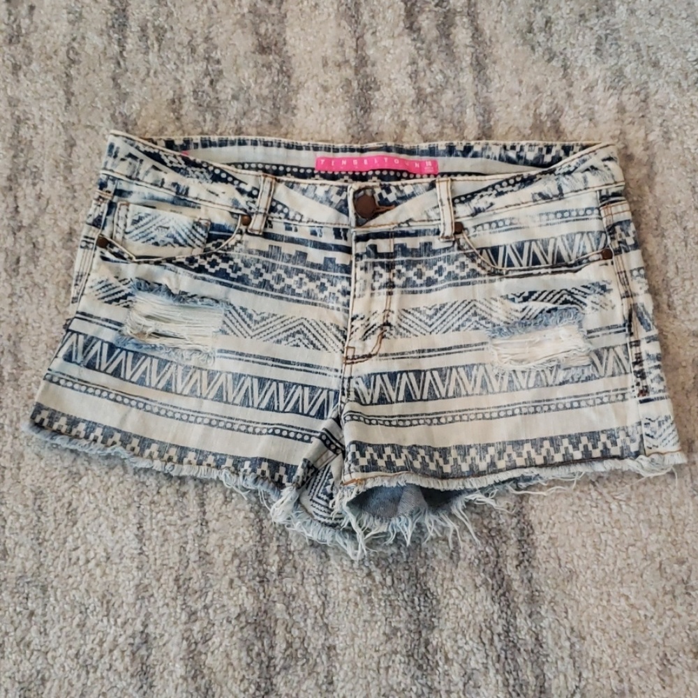 Ripped Aztec print shorts